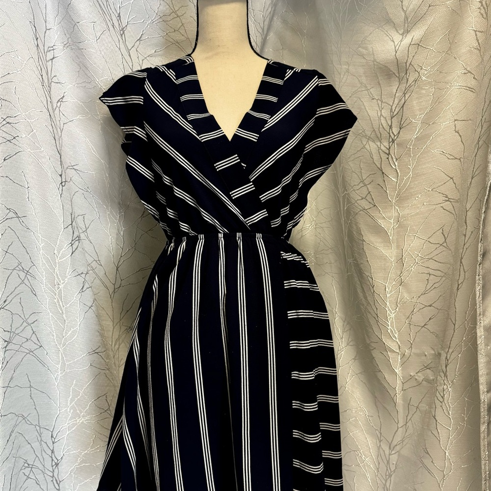Navy and white v-neck striped dress with flutter sleeves